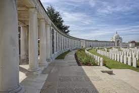 White graves are near a white colonnade